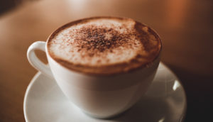 a latte served at the Milkman, a perfect place to begin any Edinburgh itinerary.