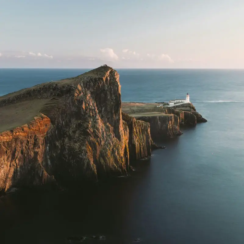 Scotland's Neist Point Lighthouse, an important location when thinking about what to wear in Scotland.