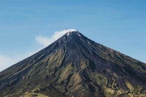 Mayon Volcano in Legzapi on a clear summer day in the Philippines, one of the best times to visit for hiking in this northern region.