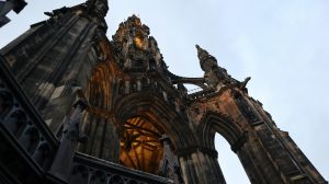 an up-close photo looking up at a Victorian gothic monument
