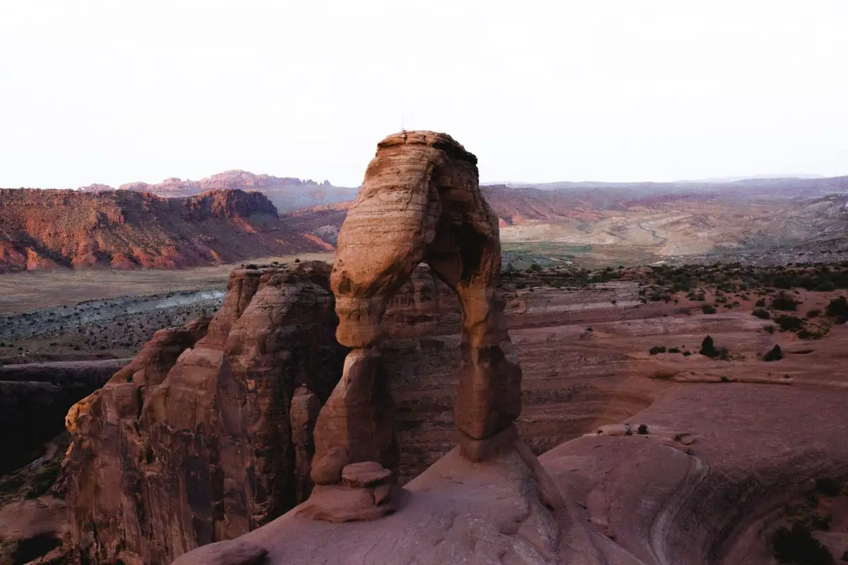 the delicate arch during sunrise in arches national park